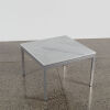 A Marble Topped Coffee Table With Stainless Legs By Bromhead Design - 2