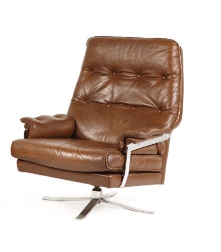 An Arne Norell Swivel High Backed Lounge Chair