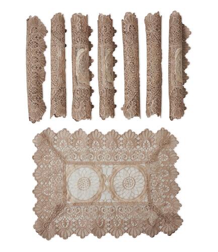 A Set of Eight Lace Place Mats