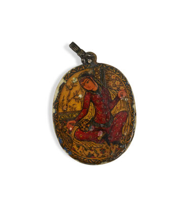 An Indian Ivory Pendant with Silver Loop
