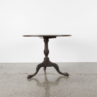 An Antique Pedestal Table