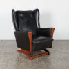 A Vintage Wingback Rocker in Black Upholstery - 2