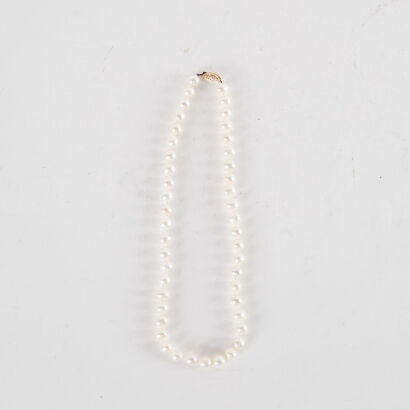 A String Of Cultured Pearls With 14K Clasps 36Cm