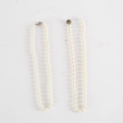 A Pair Of Faux Pearl Necklace 45Cm