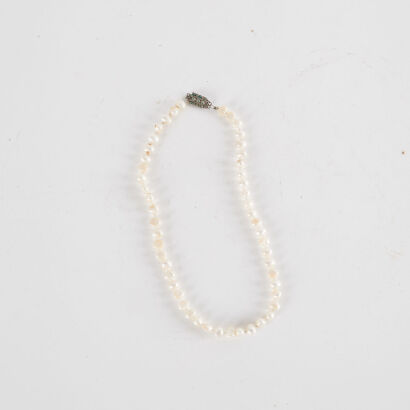 A Vintage String Of Natural Pearls With Vintage Silver Clasp 43Cm