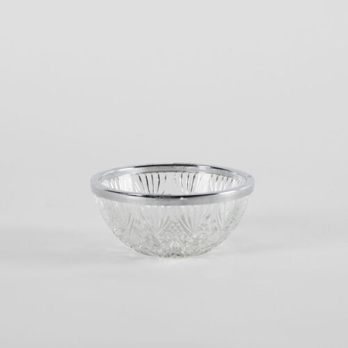 A Cut Glass Trinket Bowl With A Metal Bound Rim