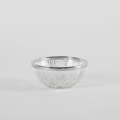 A Cut Glass Trinket Bowl With A Metal Bound Rim