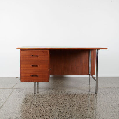 A Mid-Century Mahogany Desk With Chrome Legs