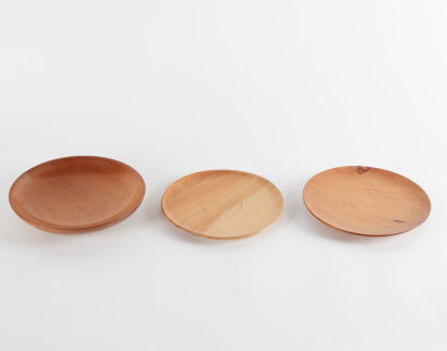 A Trio Of Wooden Plates