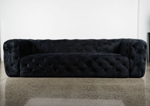 A Three Seater Button Backed Couch In Black Velour