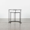 A Set Of Nesting Tables With Mirrored Gold Glass Top