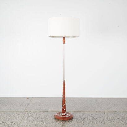 A Mid-Century Floor Lamp With Wooden Base