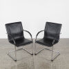 A Pair Of Black And Chrome Chairs - 2