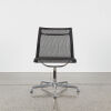 A Charles And Ray Eames EA330 Aluminium Group Mesh Chair