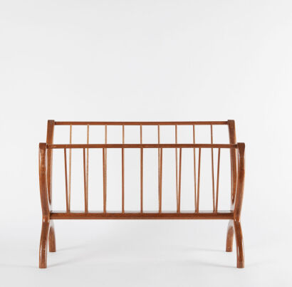 A Mid Century Wooden Wishbone Magazine Rack