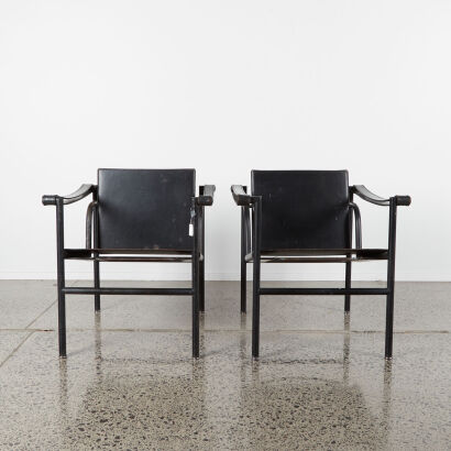 A Pair of Leather and Chrome Chairs