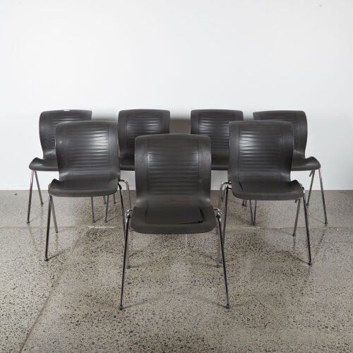 A Set Of Seven Fritz Hansen Stackable Chairs