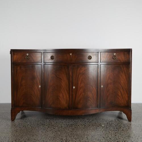 An Antique Bow-Front Sideboard