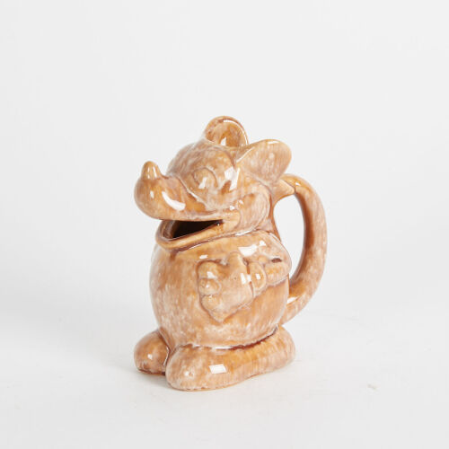 A Crown Lynn Trickle Glaze Mickey Jug