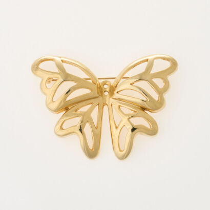 A Gold Tone Courreges Butterfly Brooch