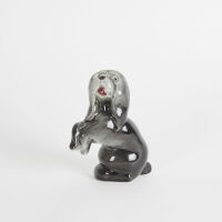 A Crown Lynn Slip Cast Sitting Dog