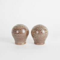 A Pair of Ceramic Salt and Pepper Shakers