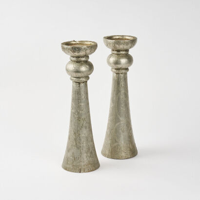 A Pair Of Wooden Encased Silver Pillar Candle Holders