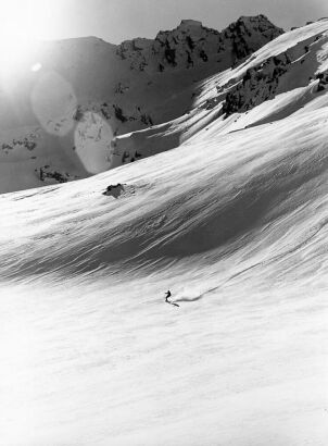 UNKNOWN PHOTOGRAPHER FOR MOUNT COOK LINE A solitary skiier on the snows of Shadow Basin in the Remarkables Ski Area.