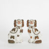 A Pair of Antique Staffordshire Copper Lustre Dogs