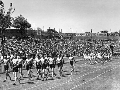 UNKNOWN PHOTOGRAPHER FOR AUCKLAND WEEKLY NEWS Parade of athletes at Eden Park, opening of N.Z. Amateur Athletic Championships