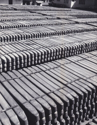 UNKNOWN PHOTOGRAPHER FOR QUEENSLAND STATE PUBLIC RELATIONS BUREAU Copper wirebars bundled for export at the Townsville, Queensland copper refinery