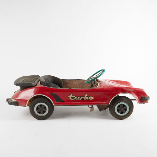 A c1970's Porsche 911 Turbo Pedal Car