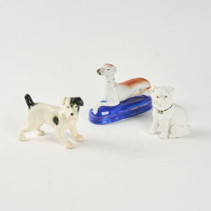 A Collection Of Three Ceramic Dogs