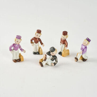 A Collection Of Five Ceramic Bellboys