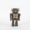 A Vintage Japanese Rotate-O-Matic Super Astronaut Tin Toy