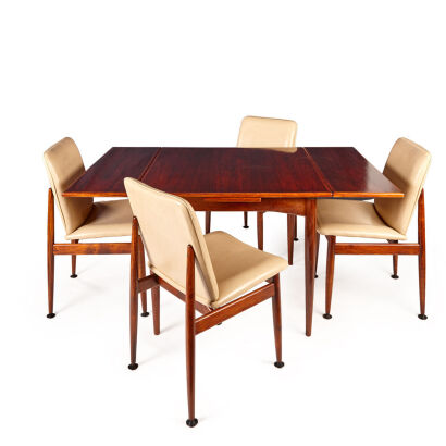 A Drop-Leaf Dining Table and Four Chairs