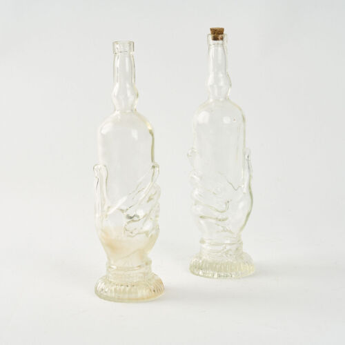 A Set of TwoHand-Shaped Bottles