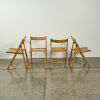 A Set of Four Folding Chairs in Solid Beech