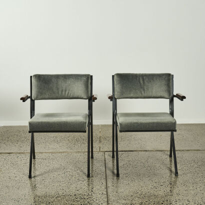 A Pair Of Mid Century Industrial Chairs In Grey Fabric