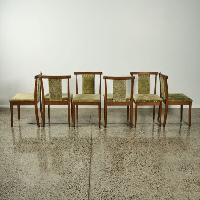 A Suit Of Six Mid-Century Teak Dining Chairs