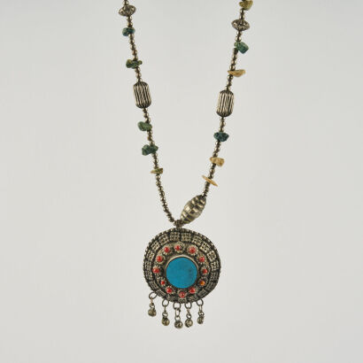 An Ethnic Metal and Turquoise Pendant Necklace