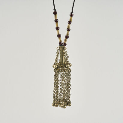 A Vintage Indian Metal Tassle Necklace On String