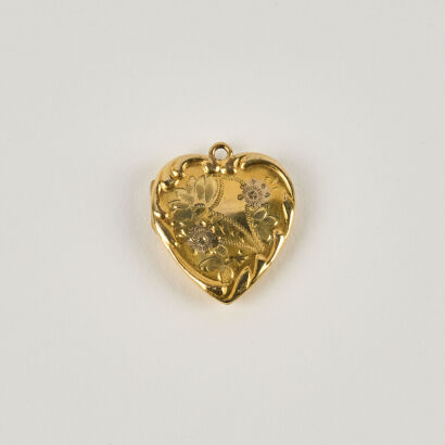 A Vintage Sterling Silver Locket With Micro Plated Gold