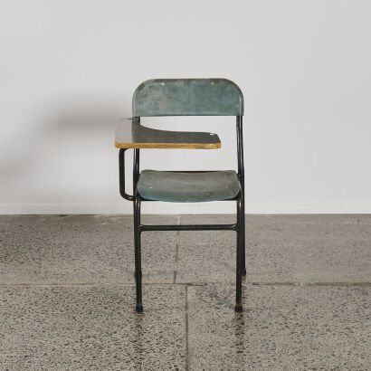 A Vintage School Chair With Ply Writing Rest