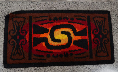 A Retro Vibrant Red And Orange Rug