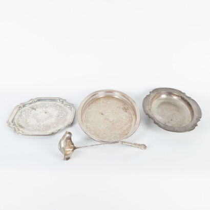 A Collection Of Silver Plated Platters And A Ladle