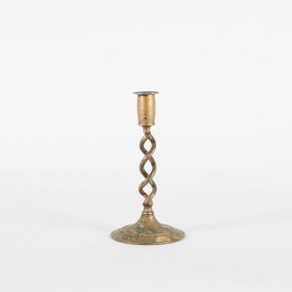 An Early Twentieth Century Patinaed Metal Candle Stick