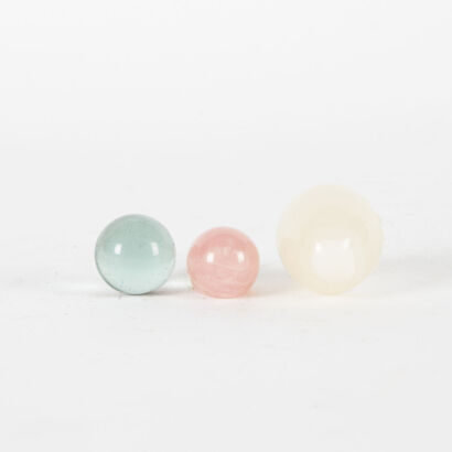 A Mexican Onyx, Rose Quartz And A Large Glass Ball