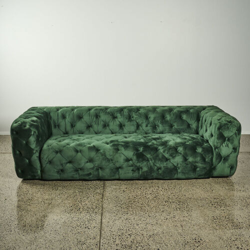 A Three Seater Green Velour Button Back Couch