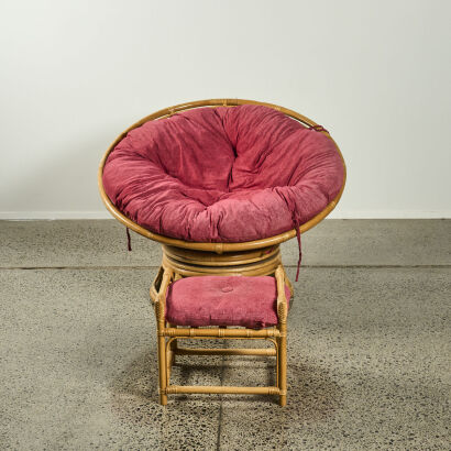 A Rattan Papasan Swivel Chair And Footstool